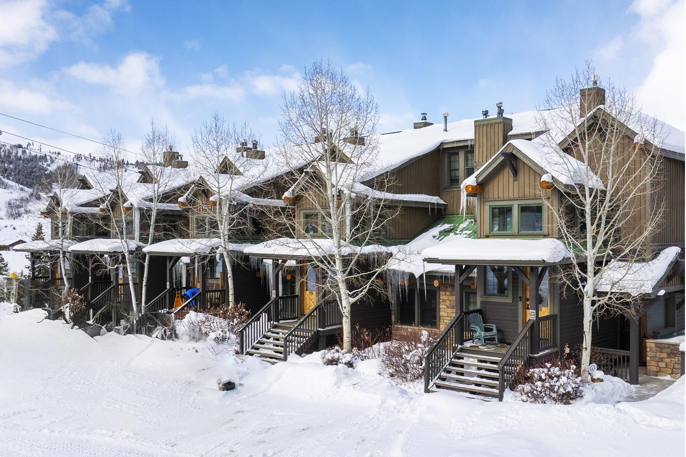 Kicking Horse Lodges in winter with snow-covered buildings